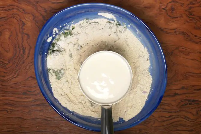 adding curd to make mysore bonda batter