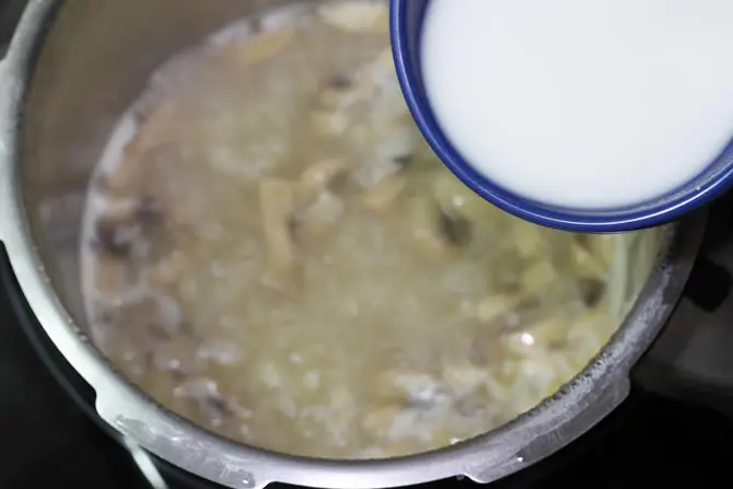 pouring starch to make mushroom soup recipe
