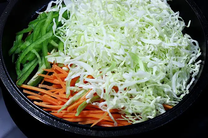 sauteing veggies to make veg noodles recipe