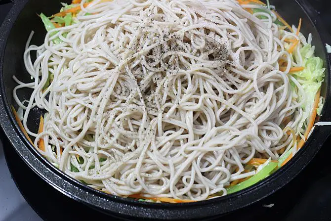 addition of salt pepper for veg noodles recipe