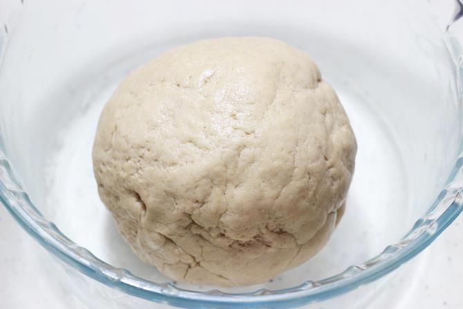 kneading dough to make veg pizza recipe