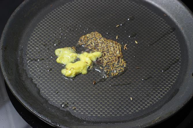 saute cumin and garlic for vegetable sandwich