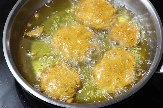 frying batter dipped potato bajji