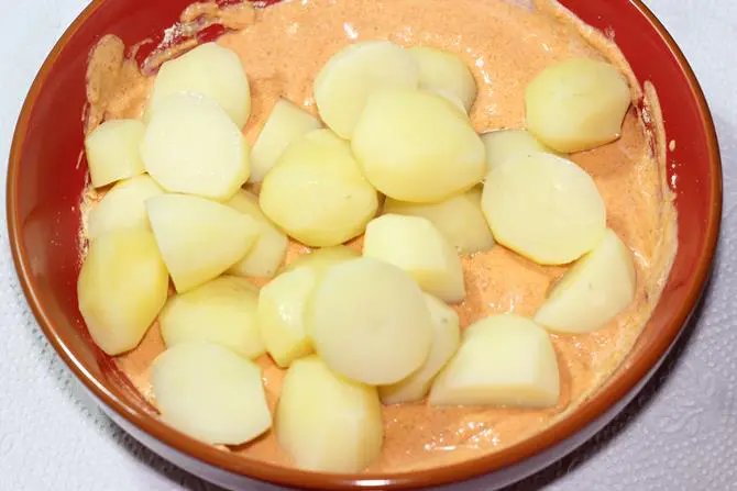 Add boiled potatoes