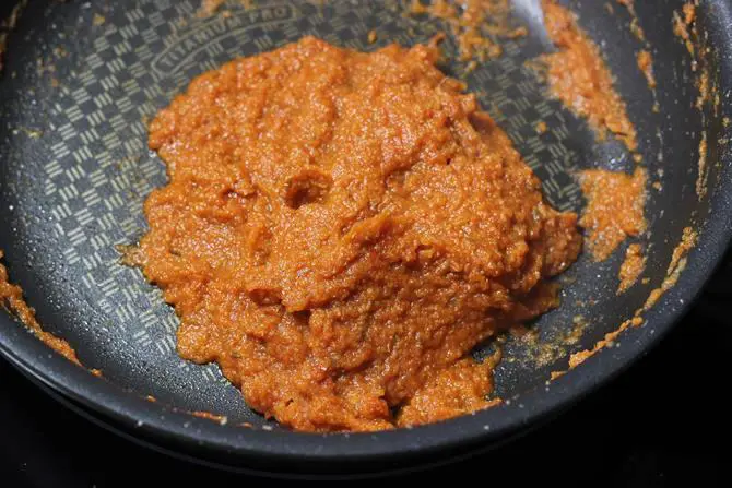 addition of garam masala chili powder to make chana paneer recipe