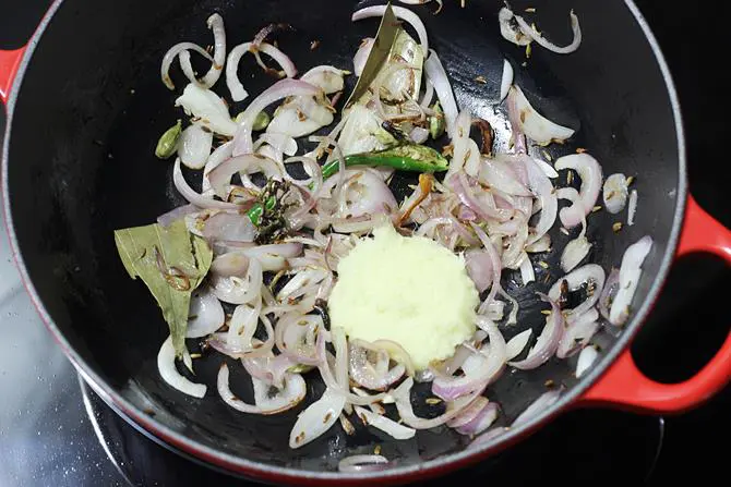 frying ginger garlic to make matar pulao recipe