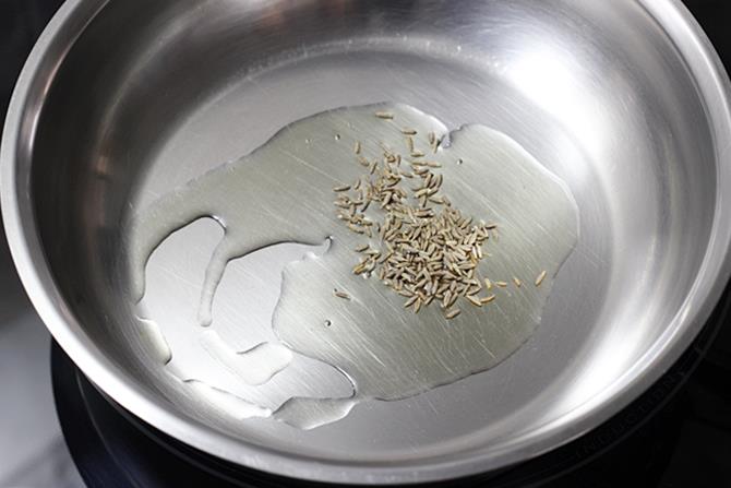 add oil to a pan and heat it