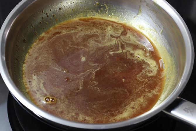 melting jaggery to make Ragi halwa