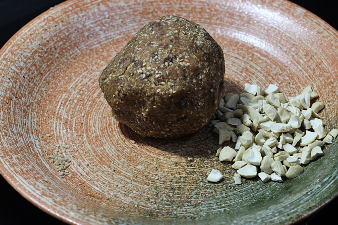 add nuts to make dates sesame ladoo recipe