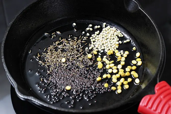 Heat oil in a pan