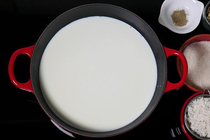 heat milk in a heavy bottom pot or kadai