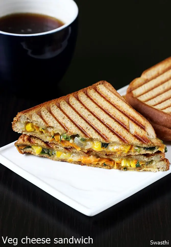 https://www.indianhealthyrecipes.com/wp-content/uploads/2016/11/veg-cheese-sandwich-recipe.jpg.webp