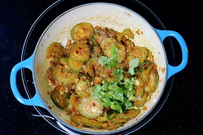 Adding coriander leaves