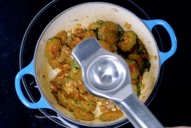 Bitter Gourd Curry   Karela Sabzi Recipe   Swasthi s Recipes - 16
