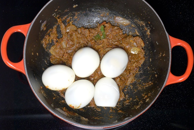 sauteing eggs to make egg roast biryani