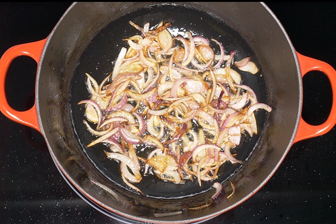 add onions and fry them evenly until golden