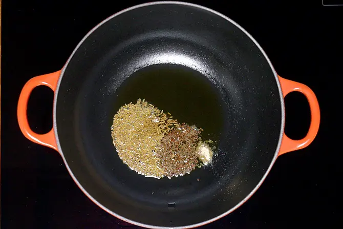 popping mustard cumin to temper dal fry