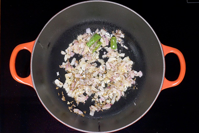 frying onions till golden to make dal