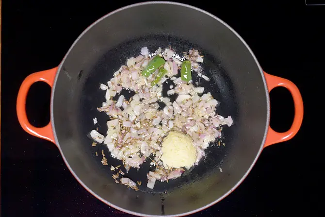 frying ginger garlic to make dal fry