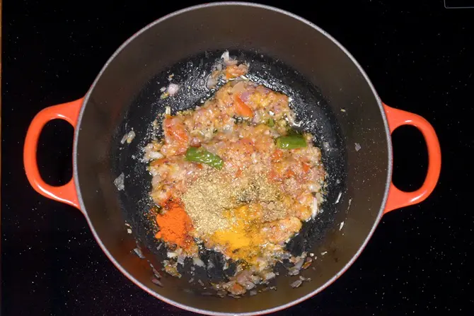 adding chilli turmeric to make dal fry