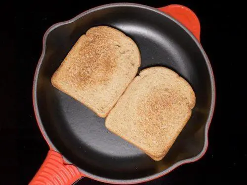toasting bread to make bread upma