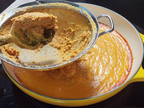 straining the gravy ingredients