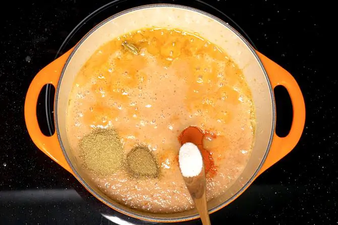 pouring tomato puree for kofta curry