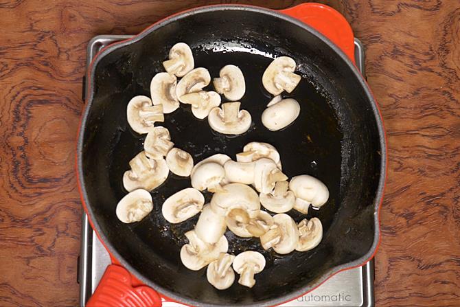 frying mushrooms to make kadai mushroom recipe