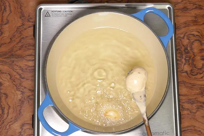 adding mushrooms to hot oil