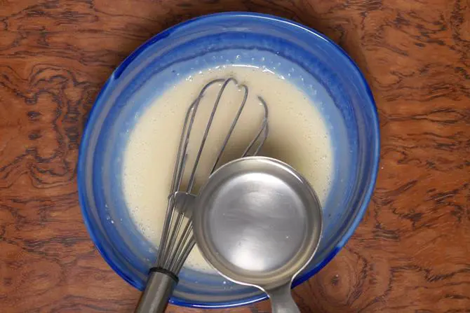 add oil and whisk