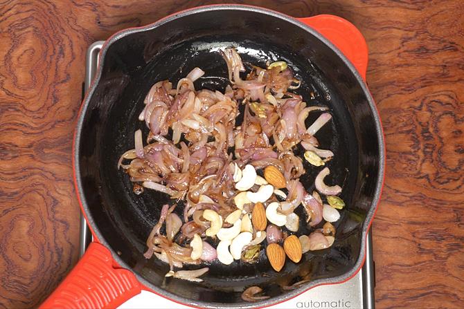 frying nuts to make chicken korma