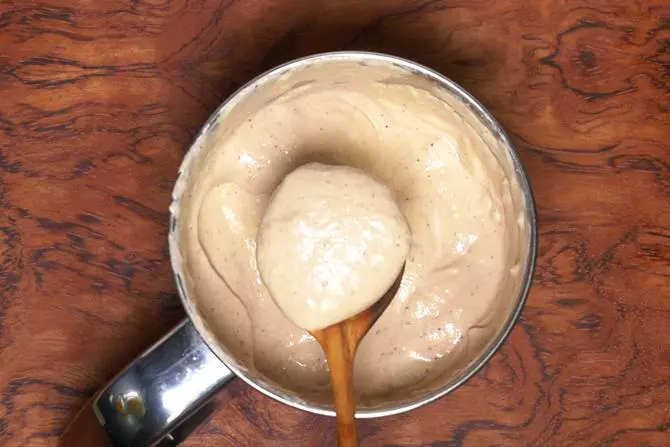 making fine onion paste for chicken korma