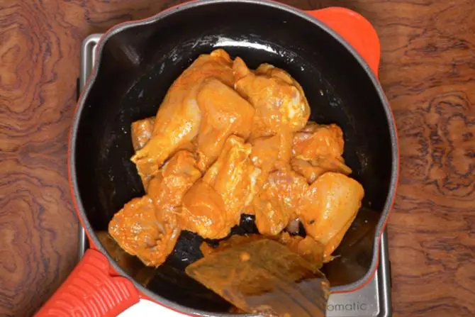 frying chicken to make korma