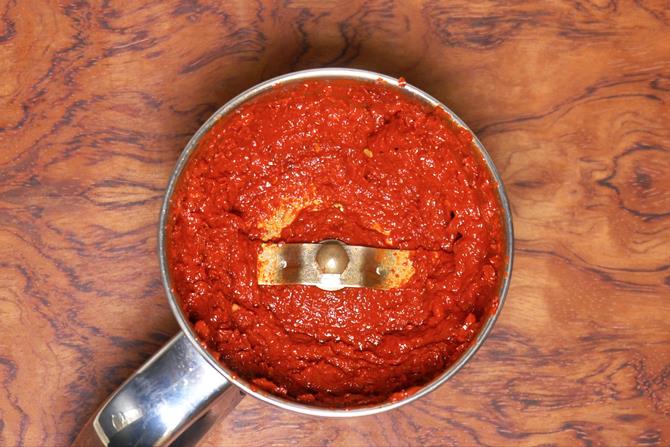 making red chili paste to make schezwan sauce