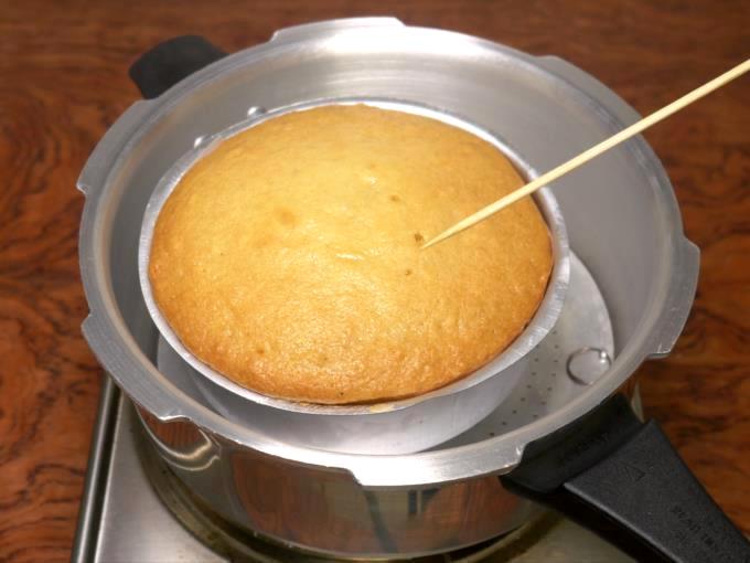 skewer comes out clean when cooker cake is done
