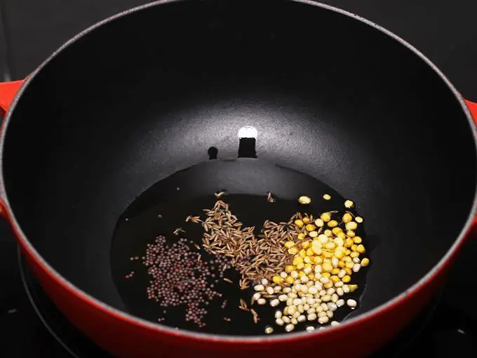 spices tempering in oil for poori curry