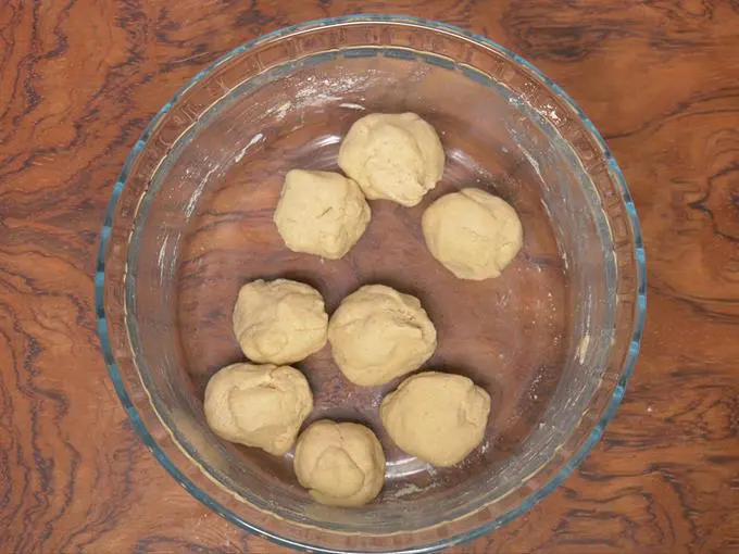 dividing the dough to balls to make puri recipe