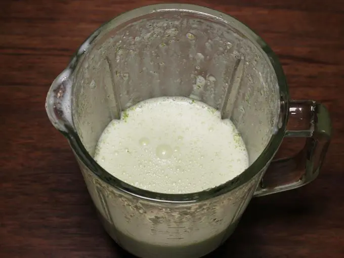 blending ingredients to make lassi