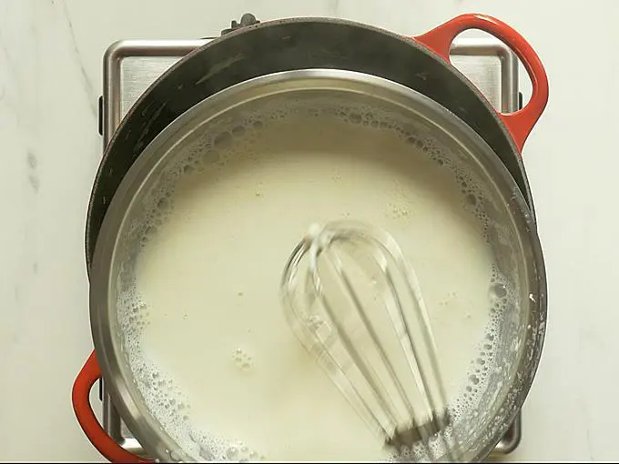 whisk the milk well before adding to make lauki ka halwa