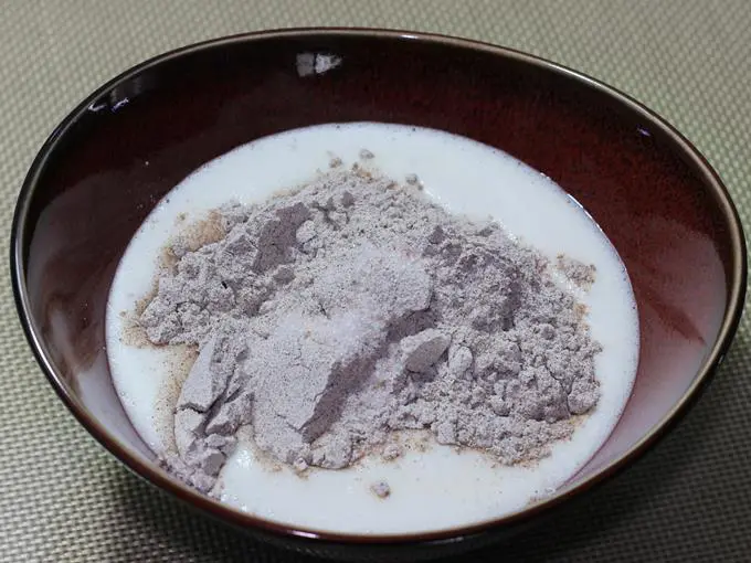 adding ragi flour, salt to a make batter