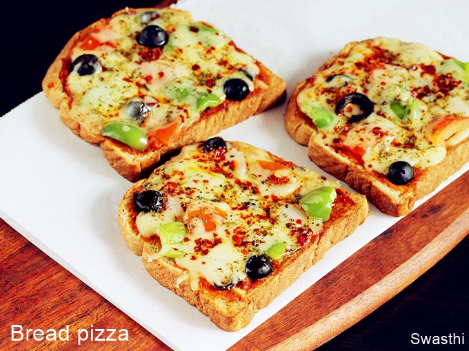 Bread pizza recipe  How to make bread pizza - Swasthi's 