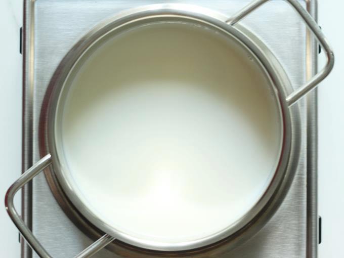 boiling milk on a medium flame to make curd