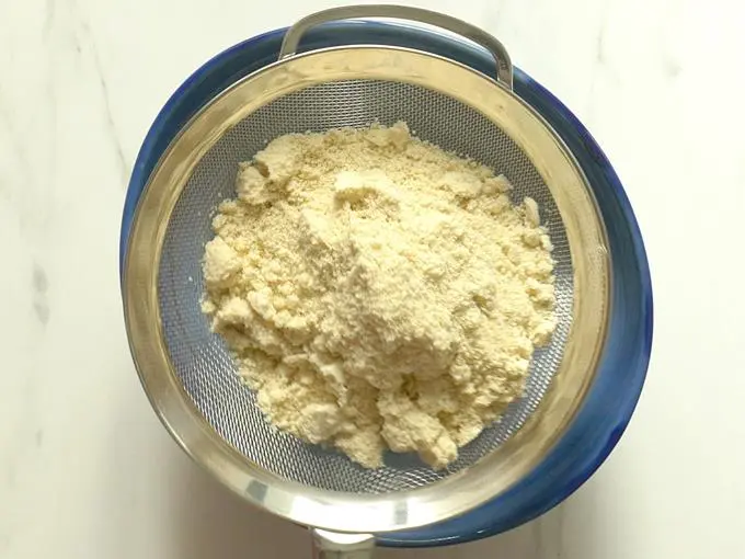 sieve cashew powder to make kaju katli