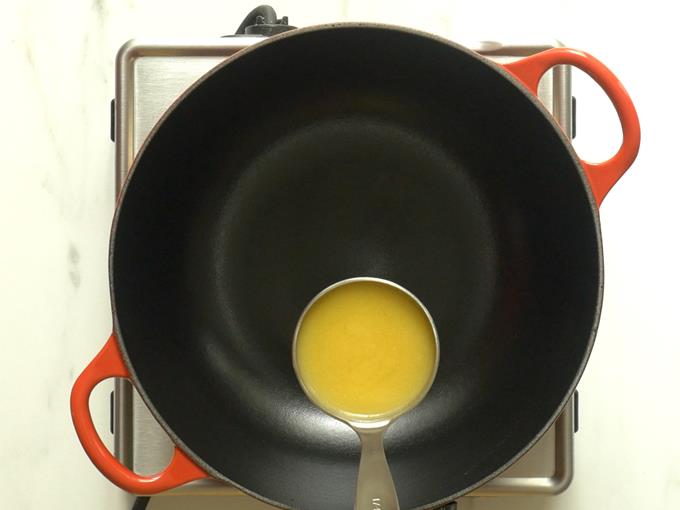 pouring ghee to pan