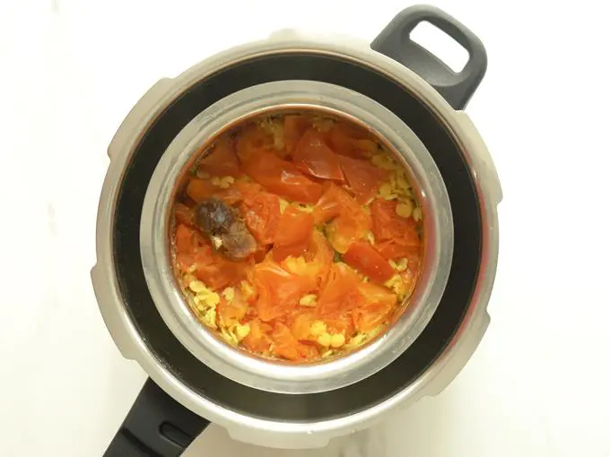 cooked tomato dal