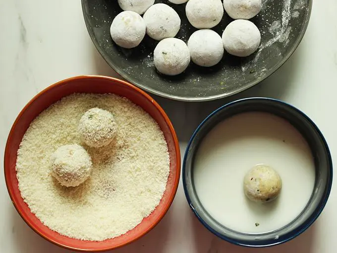 coating the cheese balls with bread crumbs