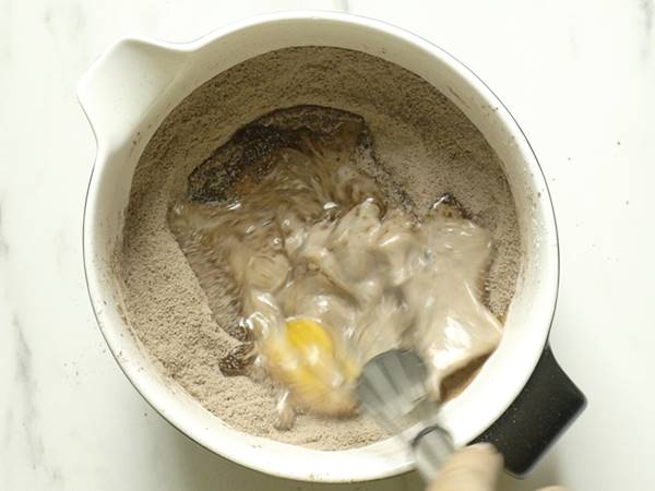 Whisk the wet ingredients to make chocolate cake