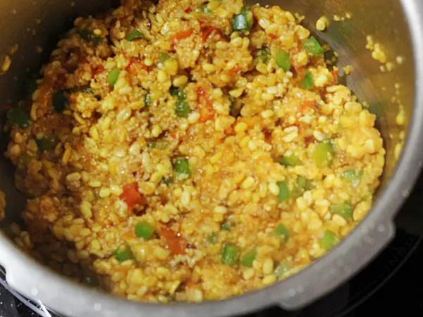 frying dalia to make khichdi