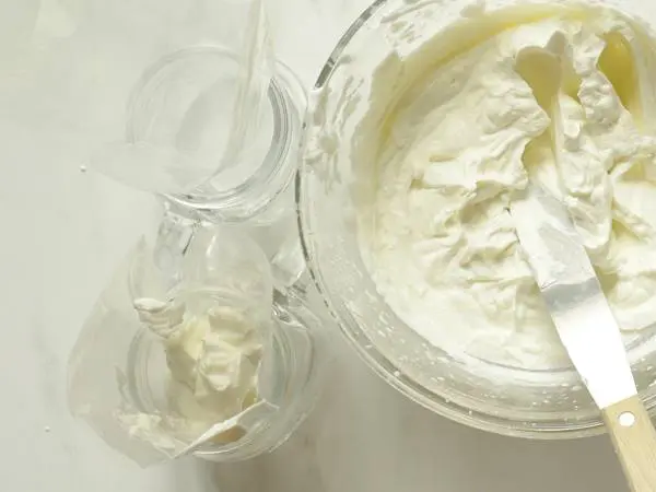 Fit a pipping nozzle inside a piping bag