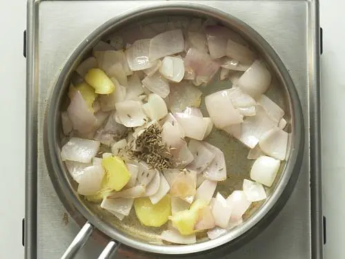 adding cumin to make allam chutney